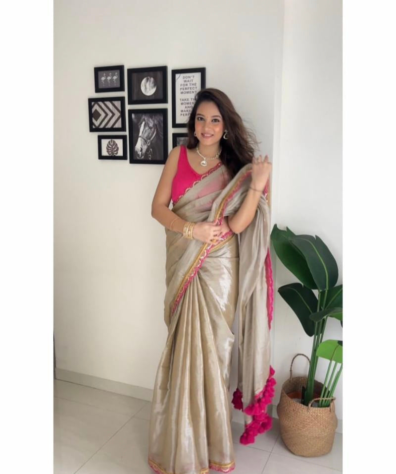 Presenting you trending gold tissue  Saree with fancy lace border 25 lotkan